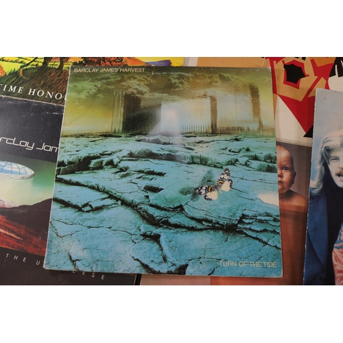 59 - In total, a collection of 11 Barclay James Harvest Albums. Titles include 