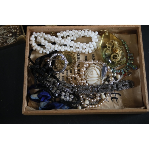 713 - Large collection of costume jewellery including millefiori beads, butterscotch amber style pearls, a... 