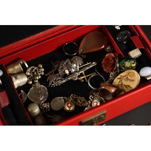 714 - A beautiful basket of vintage costume jewellery, in a red container. Includes rings, earrings and ne... 