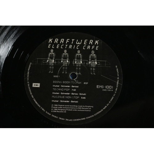 76 - Kraftwerk, Electric Cafe, EMI 1001, fair to good used condition. Kraftwerk,  Computer World, EMC 337... 