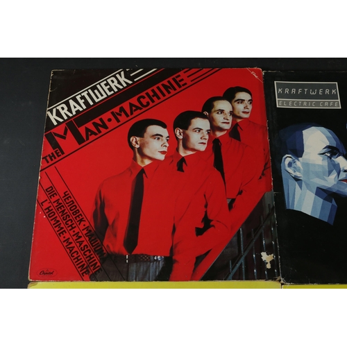 76 - Kraftwerk, Electric Cafe, EMI 1001, fair to good used condition. Kraftwerk,  Computer World, EMC 337... 