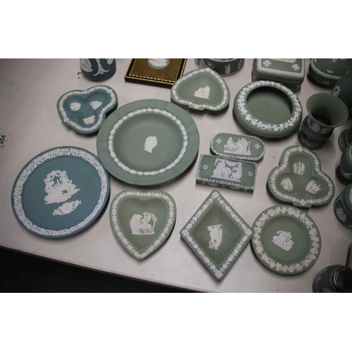 757 - Large collection of Wedgwood jasperware green