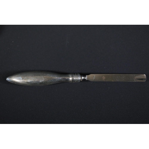 107 - Georgian Silver Spoon (Approx. 56 grams) + 6 other Silver Items

1. Georgian Silver Spoon: This silv... 