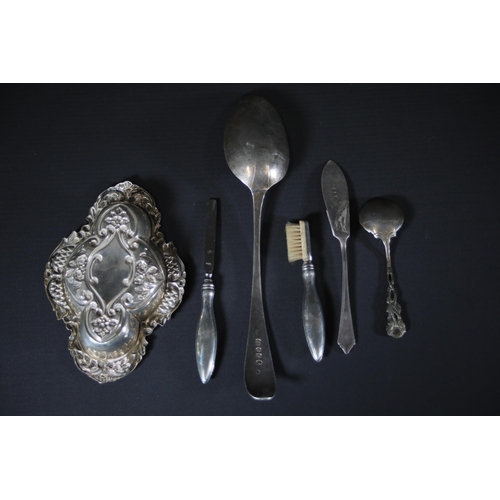 107 - Georgian Silver Spoon (Approx. 56 grams) + 6 other Silver Items

1. Georgian Silver Spoon: This silv... 