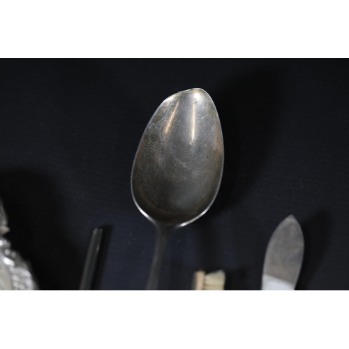 107 - Georgian Silver Spoon (Approx. 56 grams) + 6 other Silver Items

1. Georgian Silver Spoon: This silv... 