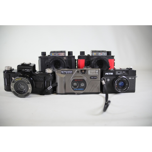 12 - Job Lot of Compact Cameras (22 Total) - Various Models and Makers

This job lot includes 22 compact ... 