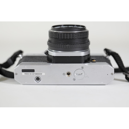 17 - Pentax K1000 35mm Film Camera with SMC Pentax-M 50mm Lens: Shutter sometimes gets stuck due to fabri... 