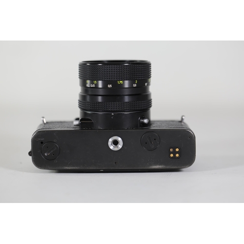 18 - Rolleiflex SL35 E Black with Rollei-HFT Planar 1.8/50mm Lens

The camera features a clear viewfinder... 