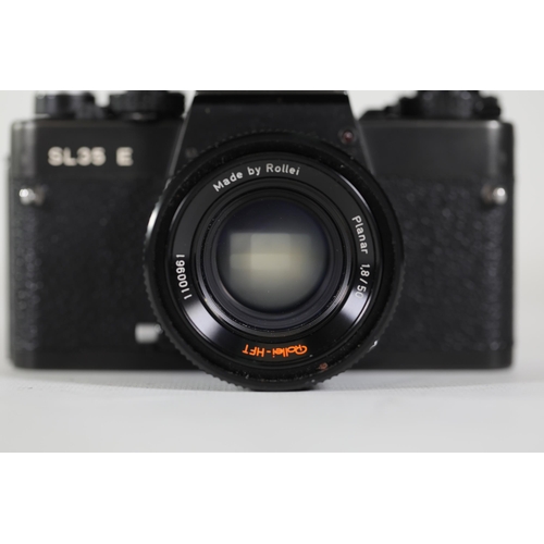 18 - Rolleiflex SL35 E Black with Rollei-HFT Planar 1.8/50mm Lens

The camera features a clear viewfinder... 