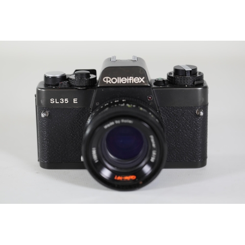 18 - Rolleiflex SL35 E Black with Rollei-HFT Planar 1.8/50mm Lens

The camera features a clear viewfinder... 