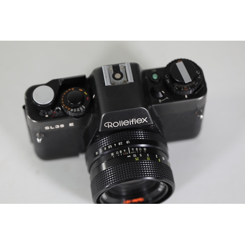 18 - Rolleiflex SL35 E Black with Rollei-HFT Planar 1.8/50mm Lens

The camera features a clear viewfinder... 