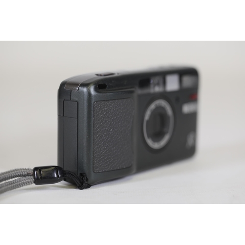 2 - Ricoh R1 35mm Compact Camera - Untested, Ideal for Parts - Note on Back with Camera Issues

This is ... 