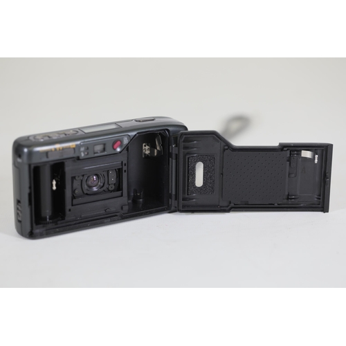 2 - Ricoh R1 35mm Compact Camera - Untested, Ideal for Parts - Note on Back with Camera Issues

This is ... 