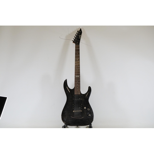 246 - LTD MH-100QMNT Electric Guitar, Serial Number L12073557

This item is an LTD MH-100QMNT electric gui... 