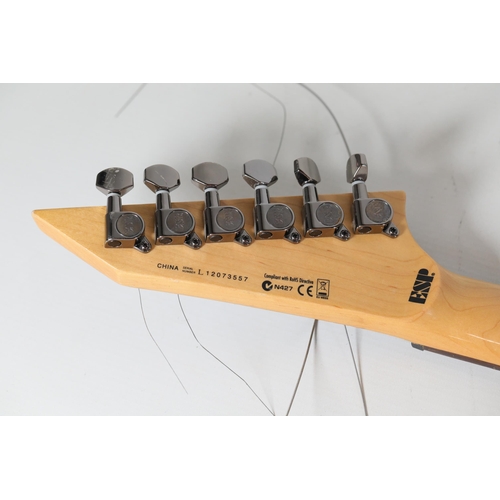 246 - LTD MH-100QMNT Electric Guitar, Serial Number L12073557

This item is an LTD MH-100QMNT electric gui... 