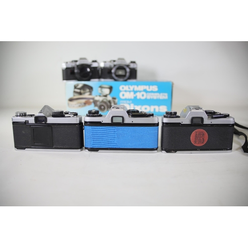 26 - 12 Mixed Lot of Olympus Vintage Film Cameras - OM Series

- 7x Olympus OM-10 (Black and Alloy)
- 1x ... 