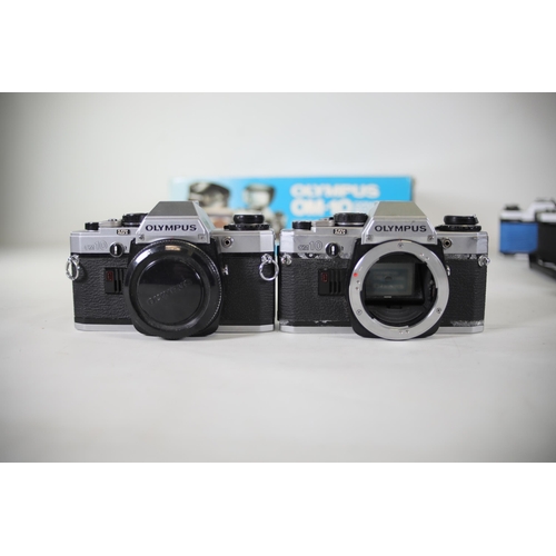 26 - 12 Mixed Lot of Olympus Vintage Film Cameras - OM Series

- 7x Olympus OM-10 (Black and Alloy)
- 1x ... 