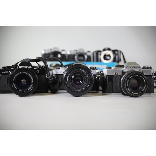 26 - 12 Mixed Lot of Olympus Vintage Film Cameras - OM Series

- 7x Olympus OM-10 (Black and Alloy)
- 1x ... 