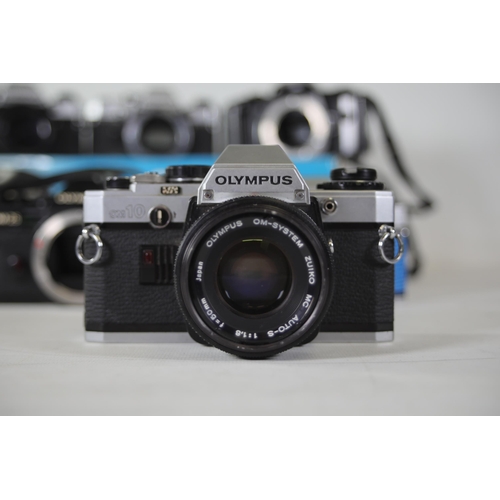 26 - 12 Mixed Lot of Olympus Vintage Film Cameras - OM Series

- 7x Olympus OM-10 (Black and Alloy)
- 1x ... 