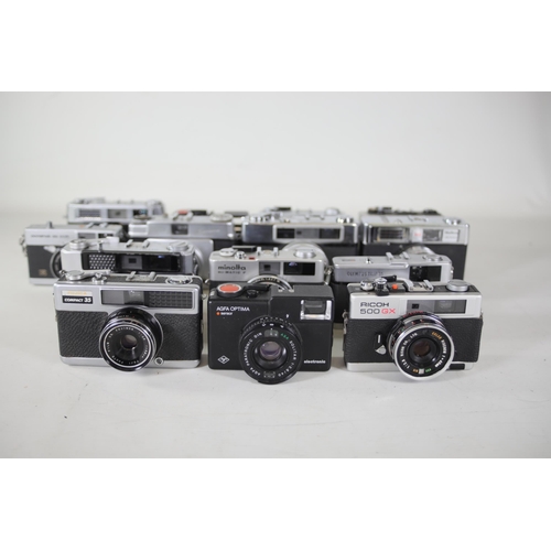 28 - 14 vintage film cameras to include Ricoh 500 GX and others.  Some of the shutters work but some do n... 