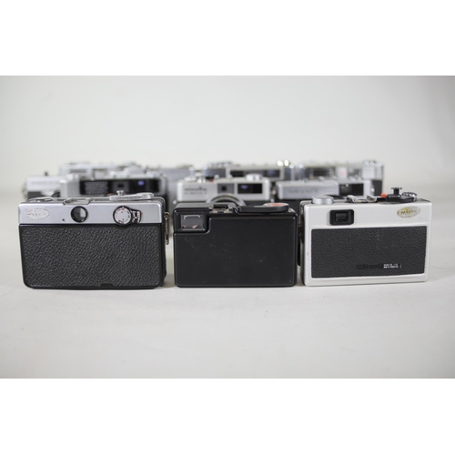 28 - 14 vintage film cameras to include Ricoh 500 GX and others.  Some of the shutters work but some do n... 