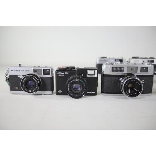 28 - 14 vintage film cameras to include Ricoh 500 GX and others.  Some of the shutters work but some do n... 