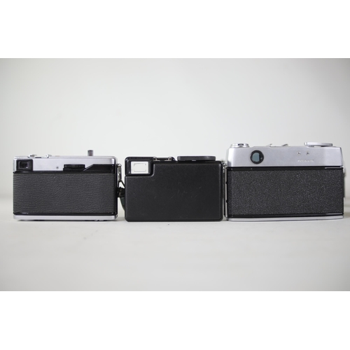 28 - 14 vintage film cameras to include Ricoh 500 GX and others.  Some of the shutters work but some do n... 