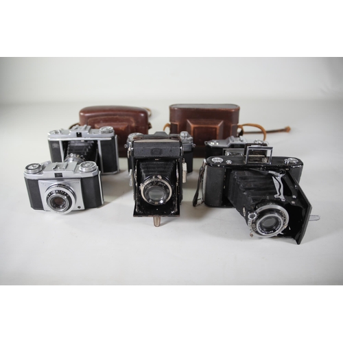 33 - 8 vintage folding cameras various zeiss ikon makes.  All of these cameras are being sold as untested... 