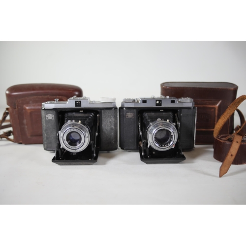 33 - 8 vintage folding cameras various zeiss ikon makes.  All of these cameras are being sold as untested... 