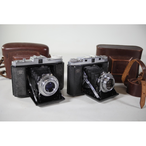 33 - 8 vintage folding cameras various zeiss ikon makes.  All of these cameras are being sold as untested... 