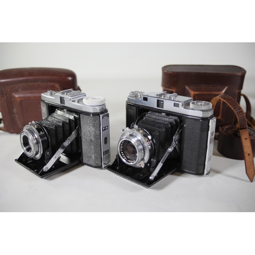 33 - 8 vintage folding cameras various zeiss ikon makes.  All of these cameras are being sold as untested... 