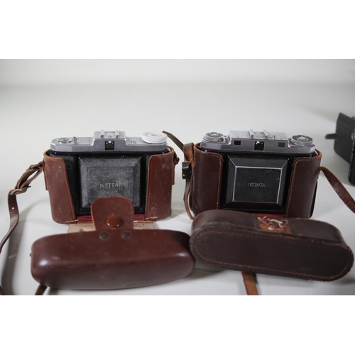 33 - 8 vintage folding cameras various zeiss ikon makes.  All of these cameras are being sold as untested... 