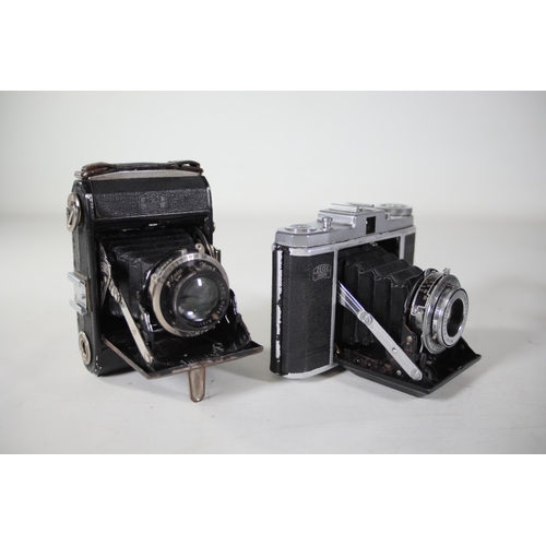 33 - 8 vintage folding cameras various zeiss ikon makes.  All of these cameras are being sold as untested... 