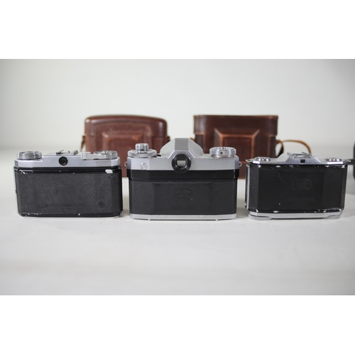 33 - 8 vintage folding cameras various zeiss ikon makes.  All of these cameras are being sold as untested... 