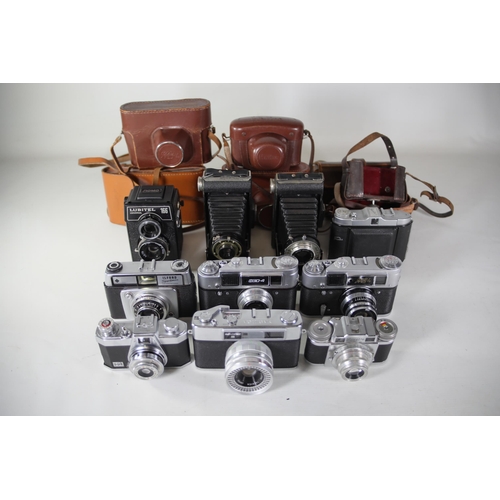 34 - 10 Various vintage cameras. All of these cameras are being sold as untested. Camera list as follows ... 