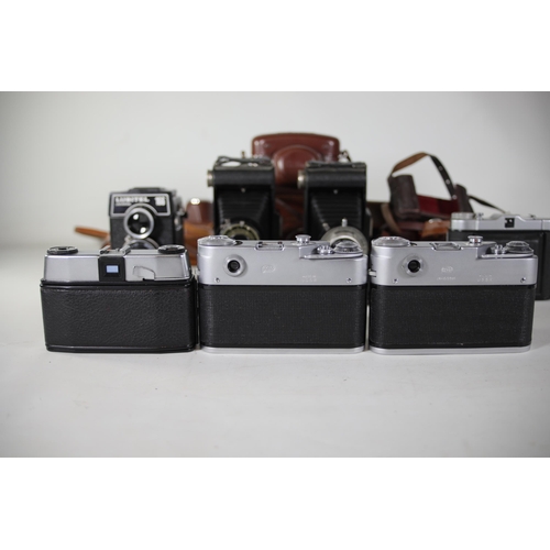 34 - 10 Various vintage cameras. All of these cameras are being sold as untested. Camera list as follows ... 