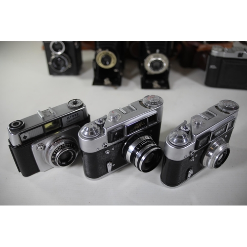 34 - 10 Various vintage cameras. All of these cameras are being sold as untested. Camera list as follows ... 