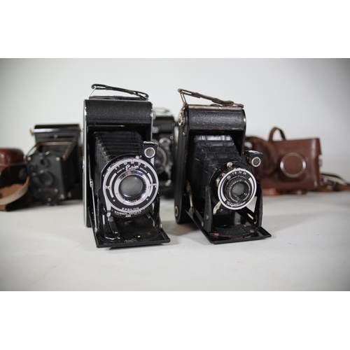 35 - 13 various vintage folding cameras. All of these cameras are being sold as untested. Camera list as ... 