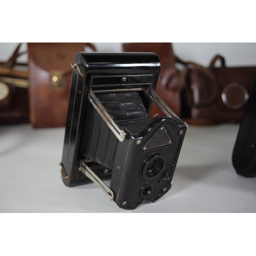 35 - 13 various vintage folding cameras. All of these cameras are being sold as untested. Camera list as ... 