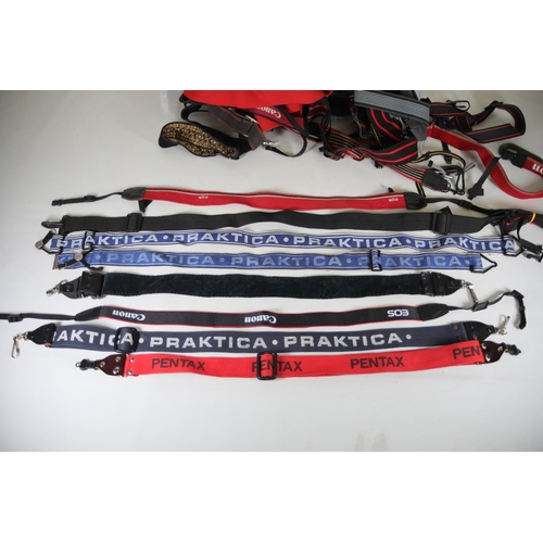 36 - Large Box of Camera Straps for Canon, Pentax, and More

This listing is for a large box full of came... 