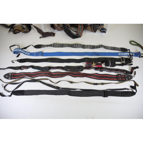 36 - Large Box of Camera Straps for Canon, Pentax, and More

This listing is for a large box full of came... 