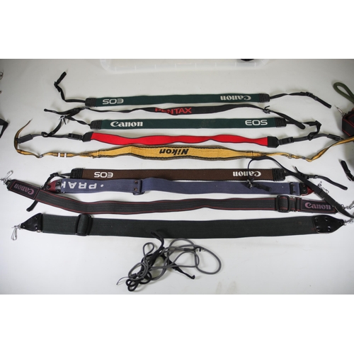 36 - Large Box of Camera Straps for Canon, Pentax, and More

This listing is for a large box full of came... 