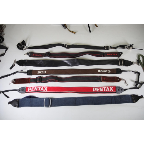 36 - Large Box of Camera Straps for Canon, Pentax, and More

This listing is for a large box full of came... 