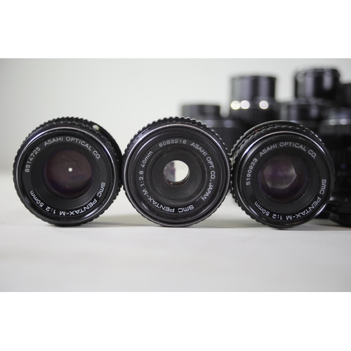 41 - Large Collection of 14 Pentax and Praktica Lenses:

1. Praktica 3.5/135 MC Carl Zeiss Jena: Lens loo... 