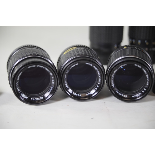 41 - Large Collection of 14 Pentax and Praktica Lenses:

1. Praktica 3.5/135 MC Carl Zeiss Jena: Lens loo... 