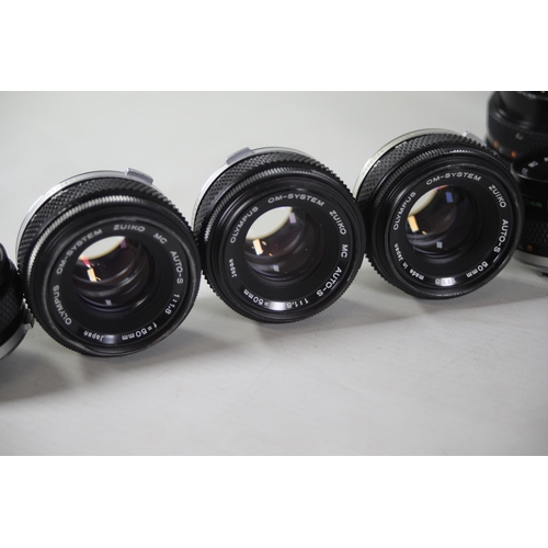 42 - Collection of 10 various Olympus Zuiko camera lenses mostly from the Om-system. The lenses are as fo... 