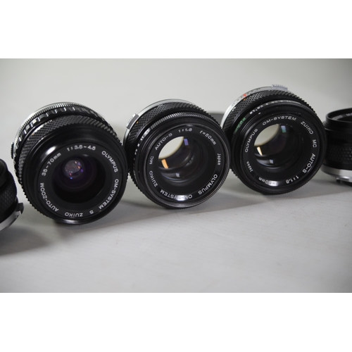 42 - Collection of 10 various Olympus Zuiko camera lenses mostly from the Om-system. The lenses are as fo... 