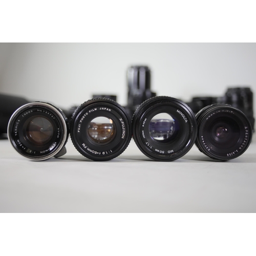 43 - Collection of 22 camera lenses: 
1. MAREP 500m - Fungus present.
2. Minolta AF zoom 70-210mm - Clear... 