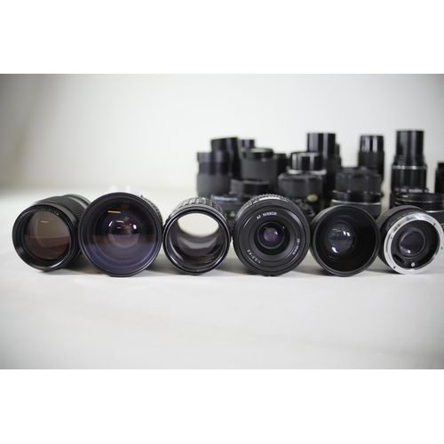 44 - Collection of 31 Camera Lenses:

1. Rolleinar-MC 135mm Lens - Clear optics with some internal dust n... 