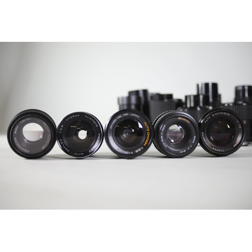 44 - Collection of 31 Camera Lenses:

1. Rolleinar-MC 135mm Lens - Clear optics with some internal dust n... 